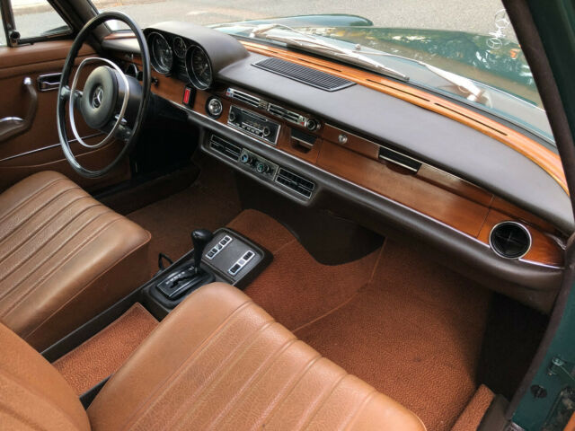 1972_mercedes_benz_280se_45_in_db_268_dark_green_w_cognac_int_ac_becker__13.jpg